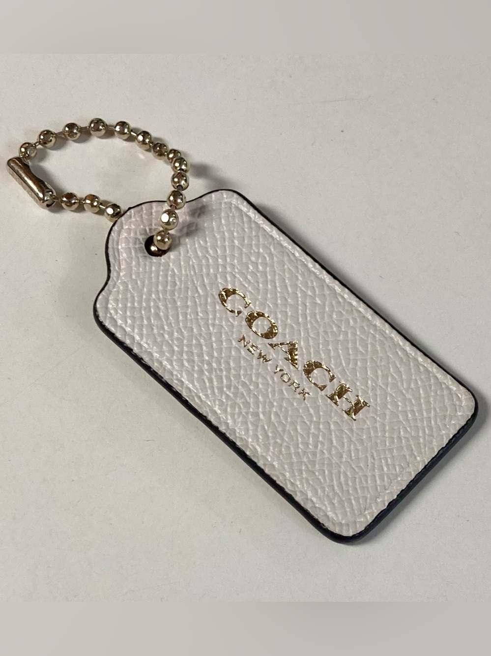 Coach New York White Logo Tag